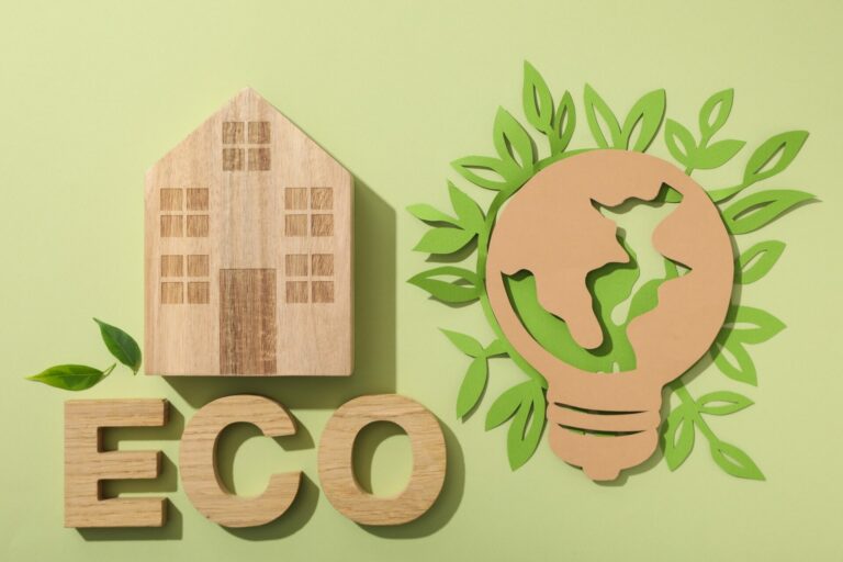 Eco house concept, wooden house with the word eco